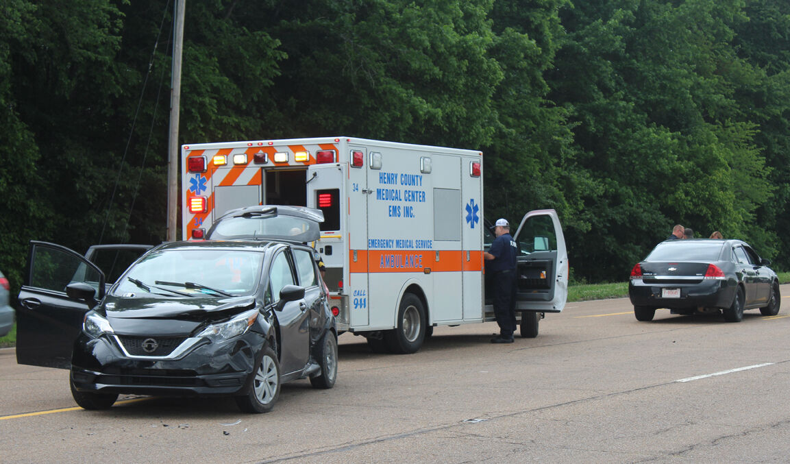 Woman taken to hospital after wreck
